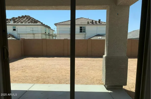 a view of a glass door of the house