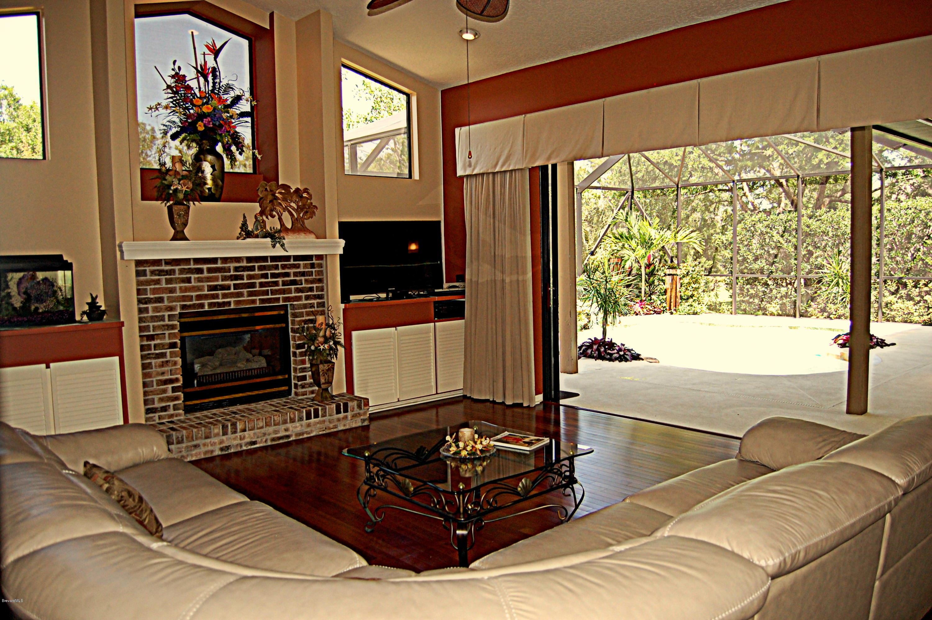 3880 Shady Run Road Melbourne, FL 32934 - Photo 4 of 41 Fam Rm opens to outside Pool/Patio