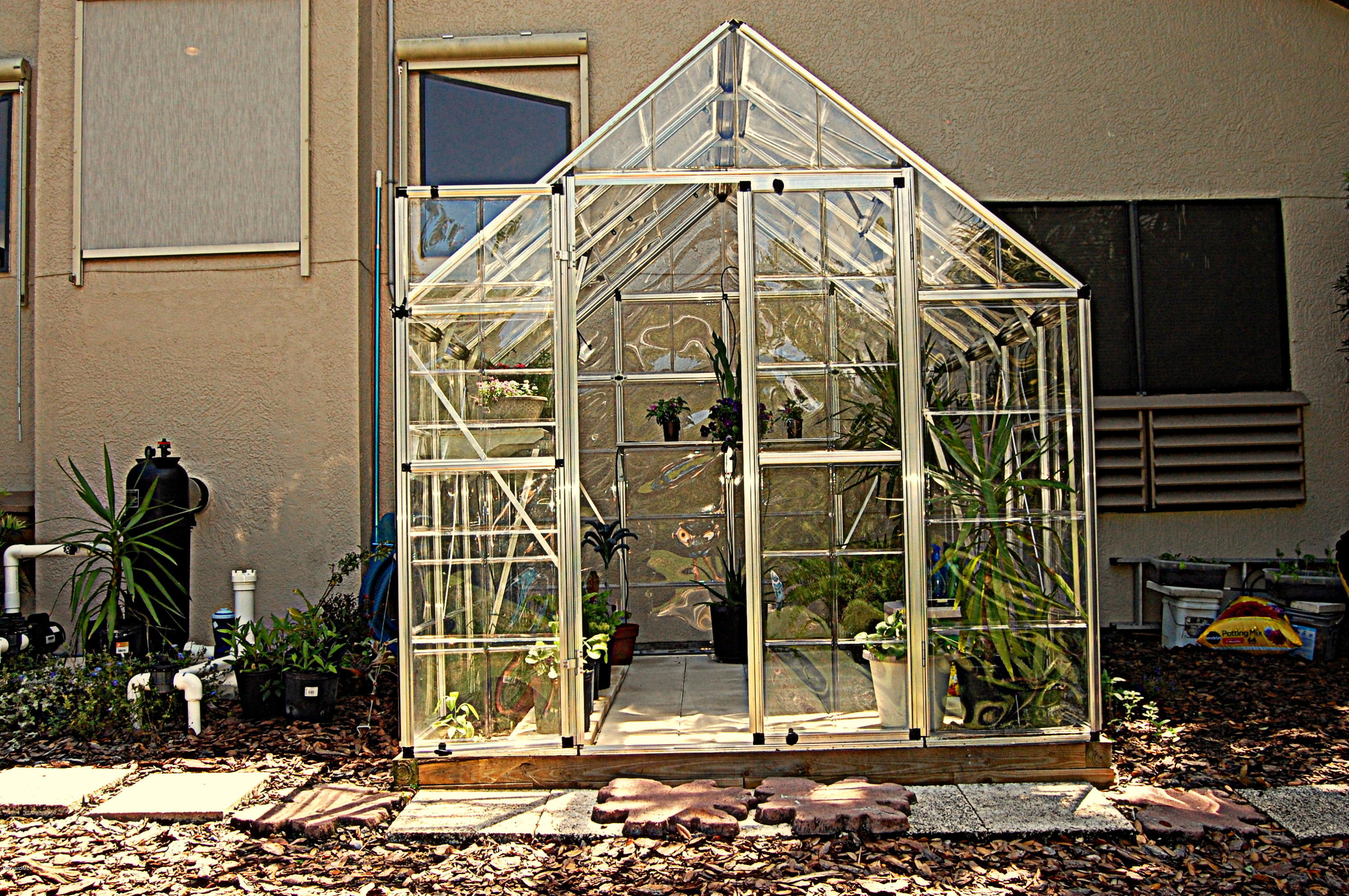 3880 Shady Run Road Melbourne, FL 32934 - Photo 32 of 41 Unique Greenhouse!