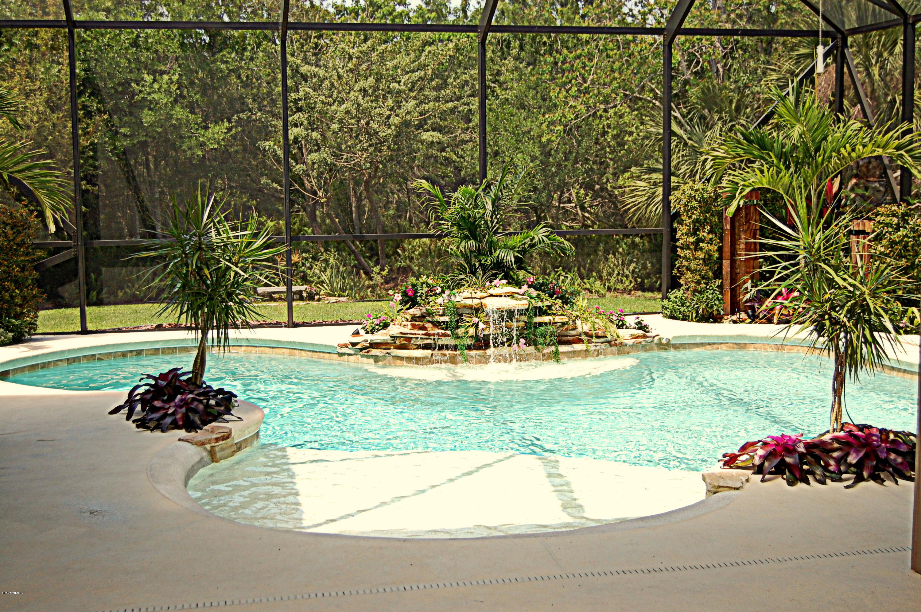 3880 Shady Run Road Melbourne, FL 32934 - Photo 6 of 41 Beautiful Pool with Waterfall!