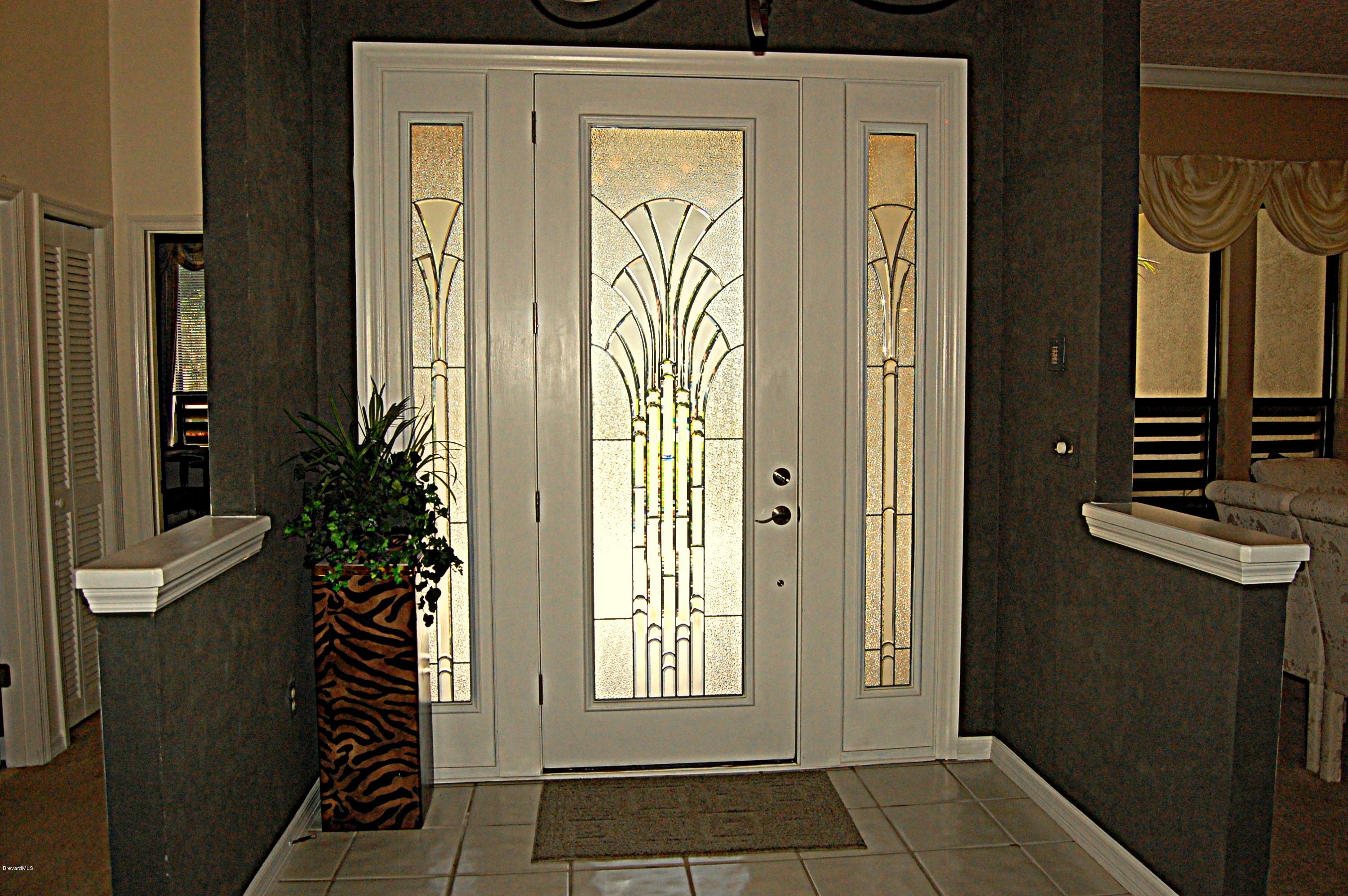 3880 Shady Run Road Melbourne, FL 32934 - Photo 8 of 41 Beautiful Front Entry