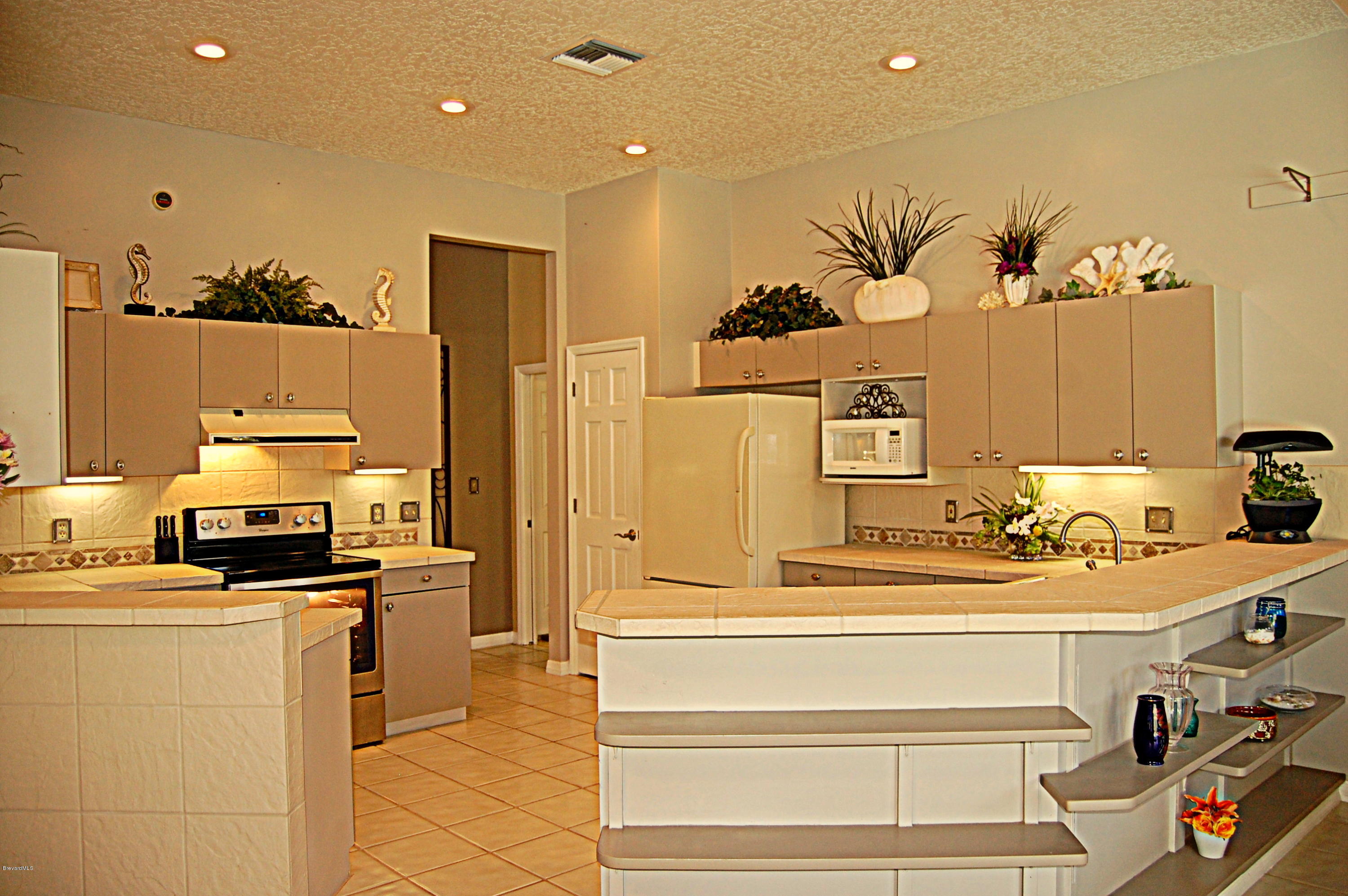 3880 Shady Run Road Melbourne, FL 32934 - Photo 10 of 41 Spacious Chef's Kitchen