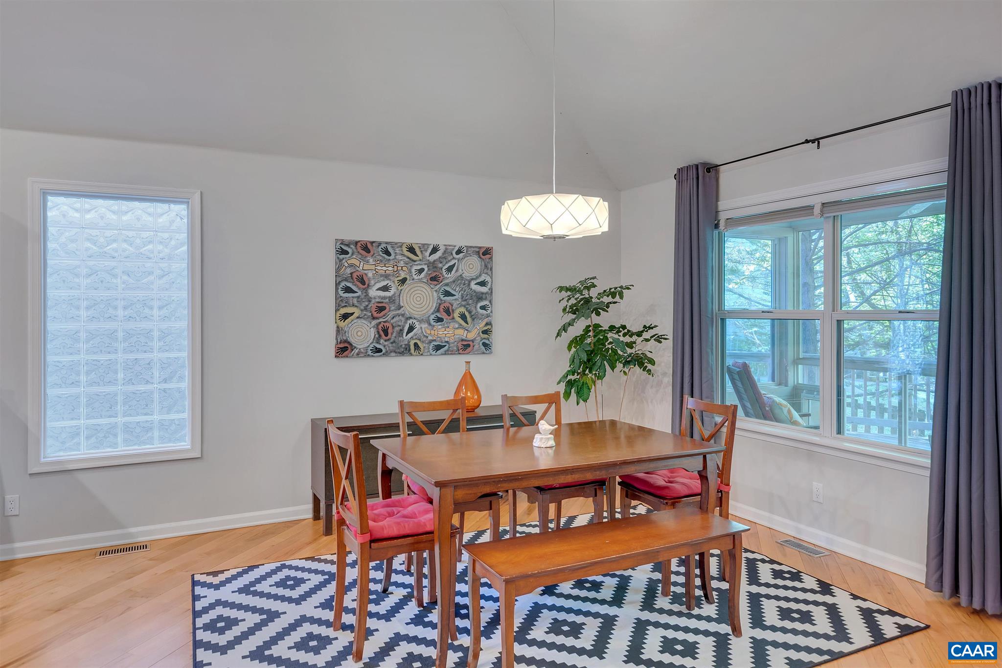 292 Blackthorn Lane Charlottesville, VA 22902 - Photo 13 of 64 a view of a dining room with furniture window and wooden floor