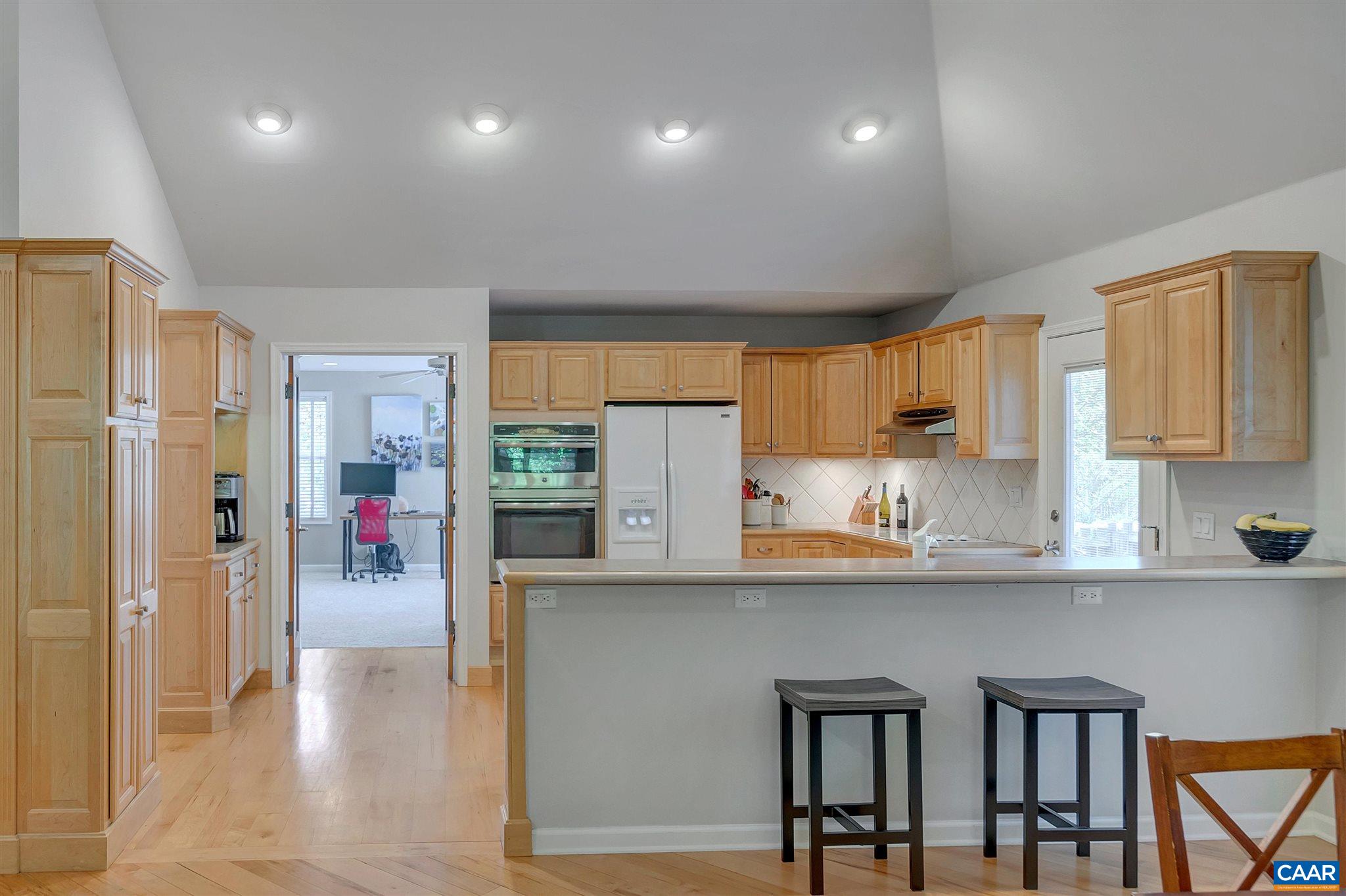 292 Blackthorn Lane Charlottesville, VA 22902 - Photo 16 of 64 a kitchen with stainless steel appliances granite countertop a refrigerator and a sink