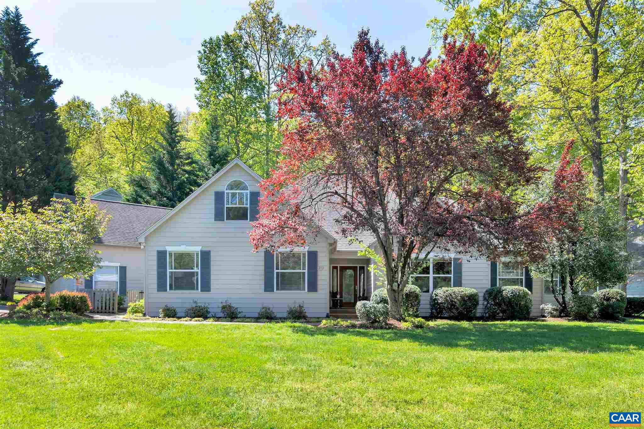 292 Blackthorn Lane Charlottesville, VA 22902 - Photo 2 of 64 a front view of a house with a garden
