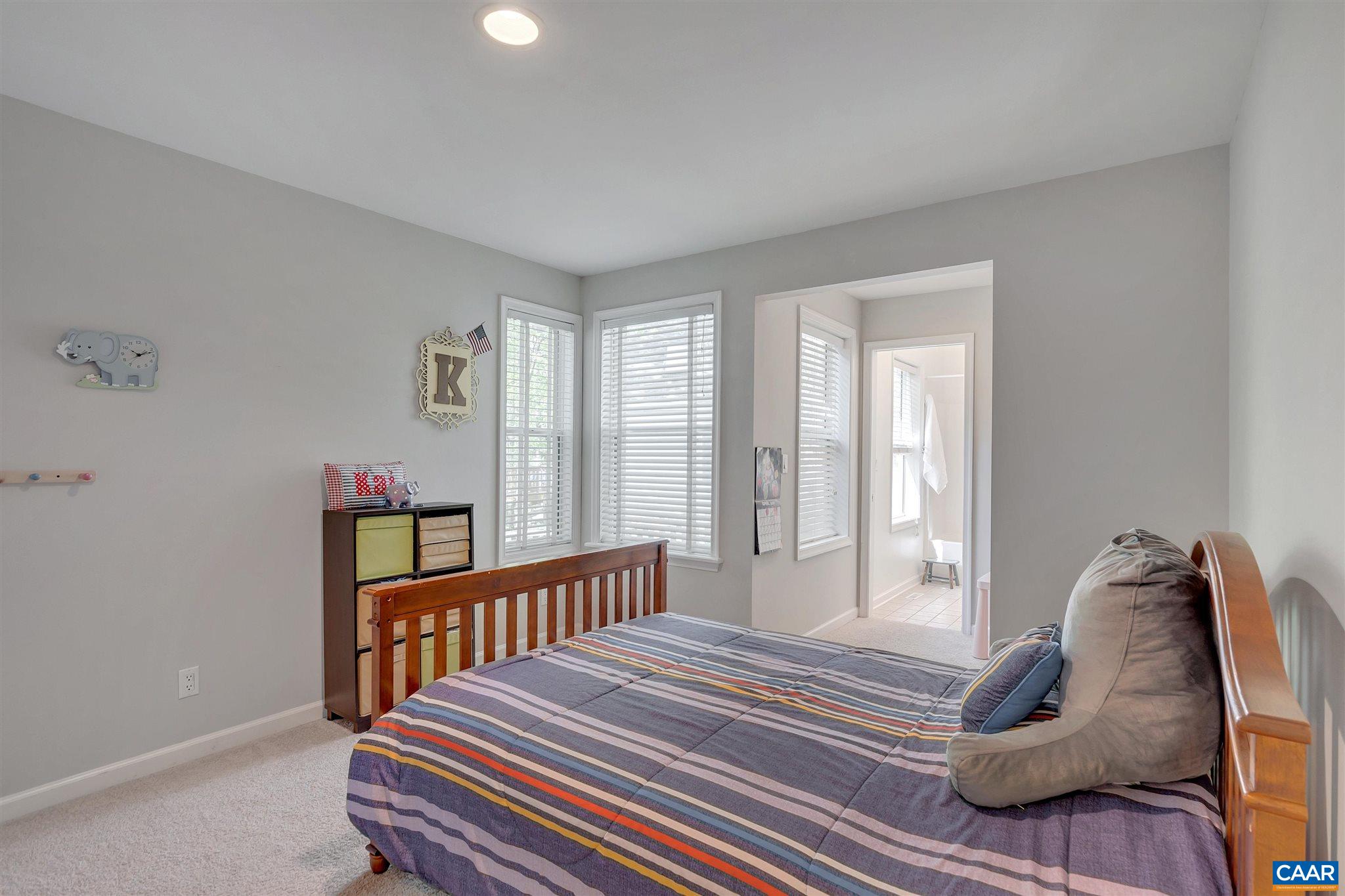 292 Blackthorn Lane Charlottesville, VA 22902 - Photo 32 of 64 a bedroom with a bed and a window