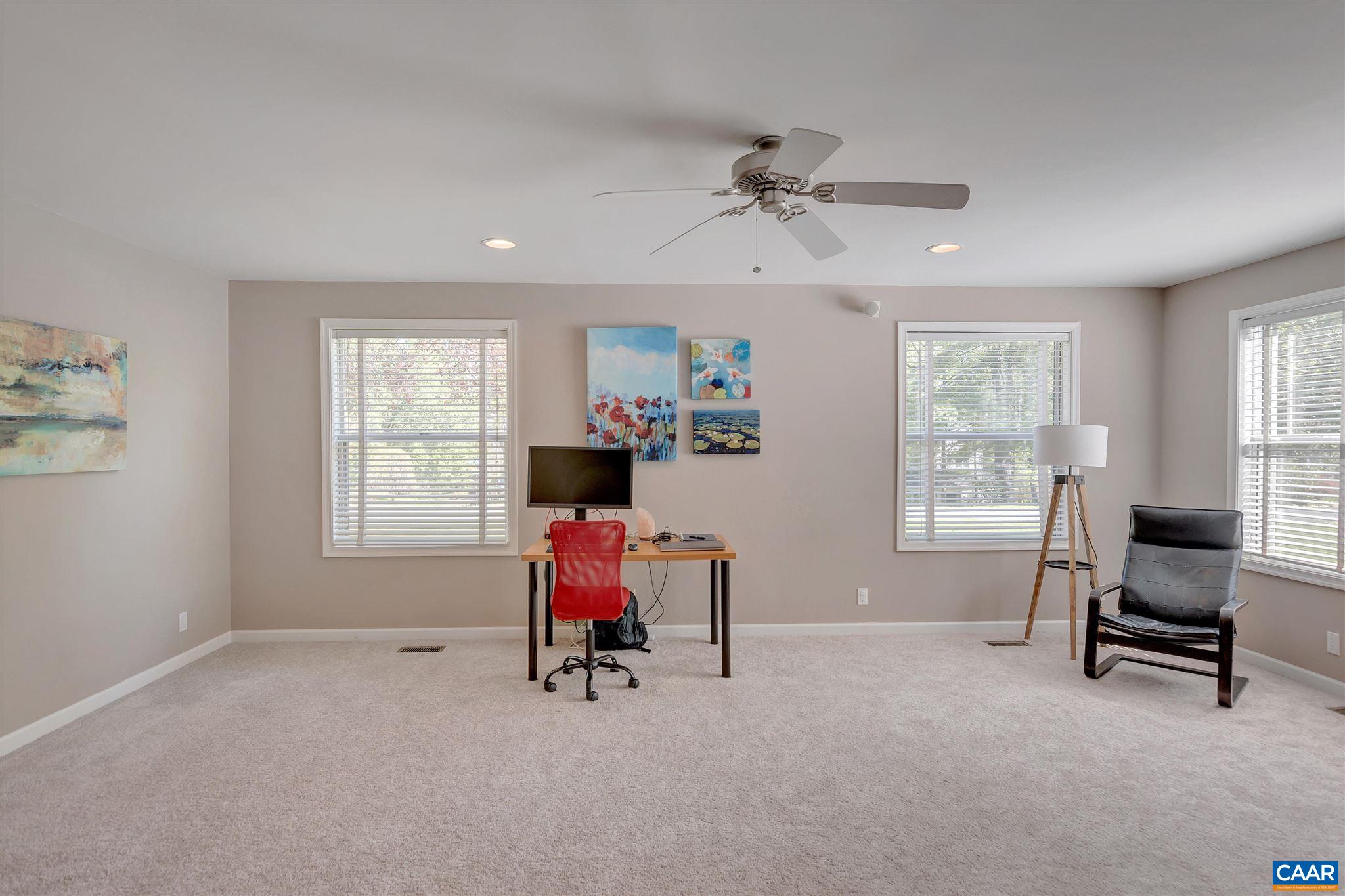 292 Blackthorn Lane Charlottesville, VA 22902 - Photo 36 of 64 a view of a livingroom with chair and a window