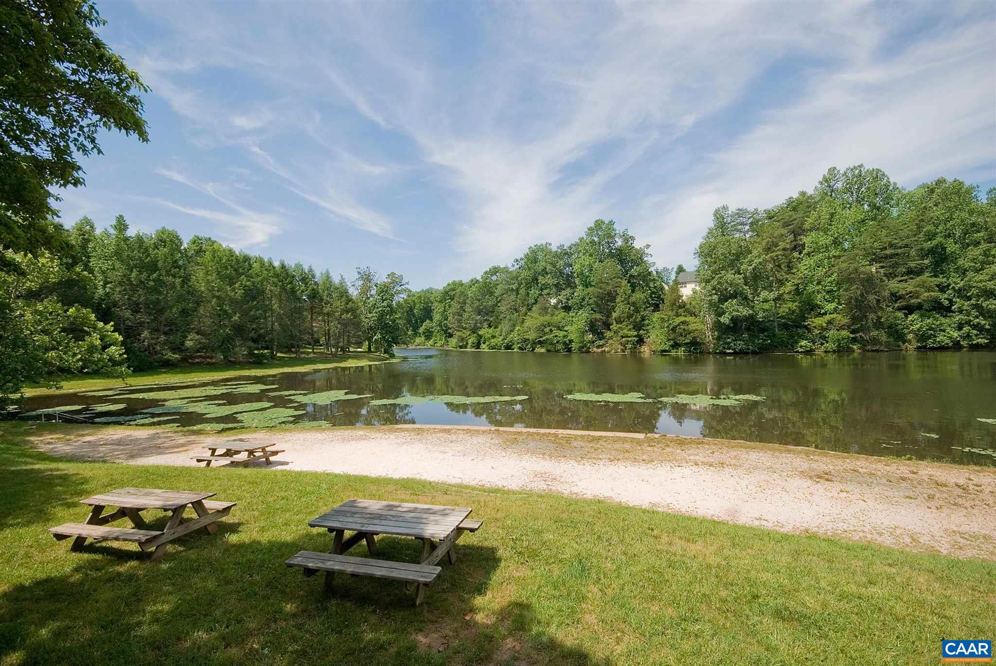 292 Blackthorn Lane Charlottesville, VA 22902 - Photo 58 of 64 a view of a lake with a yard
