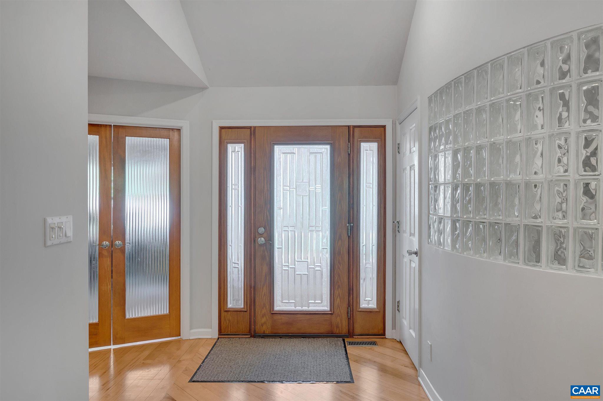 292 Blackthorn Lane Charlottesville, VA 22902 - Photo 8 of 64 a view of a room with wooden floor and windows