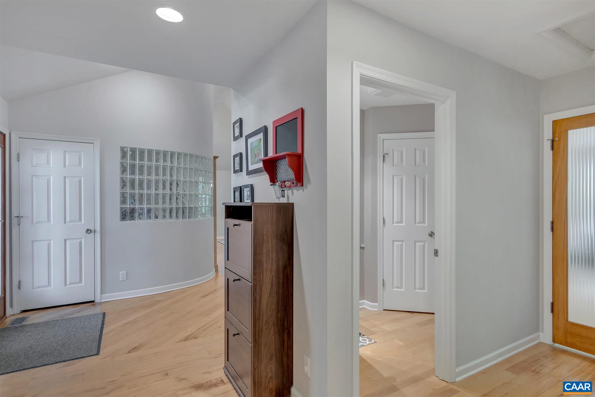 292 Blackthorn Lane Charlottesville, VA 22902 - Photo 9 of 64 a view of a hallway with closet and refrigerator