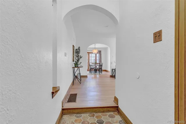a view of a hallway view with living room