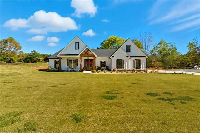 a front view of a house with a ocean view