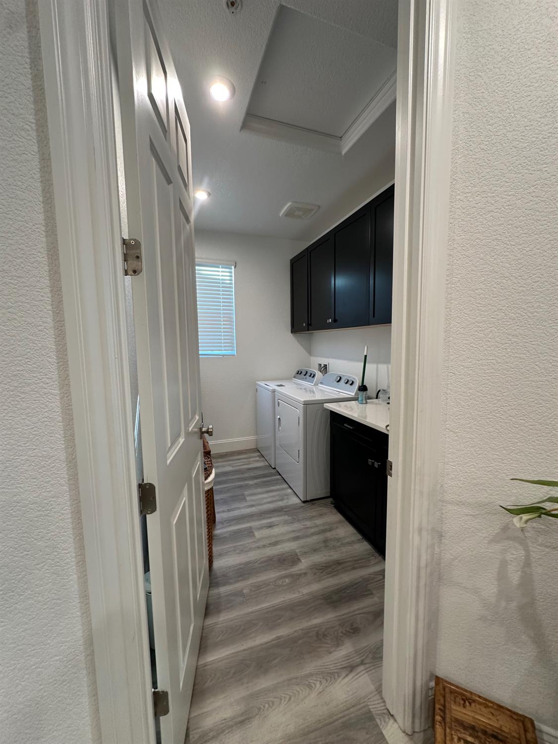 10113 Wayfaring Drive Stockton, CA 95219 - Photo 20 of 26 a en suite bathroom with a sink a mirror and shower