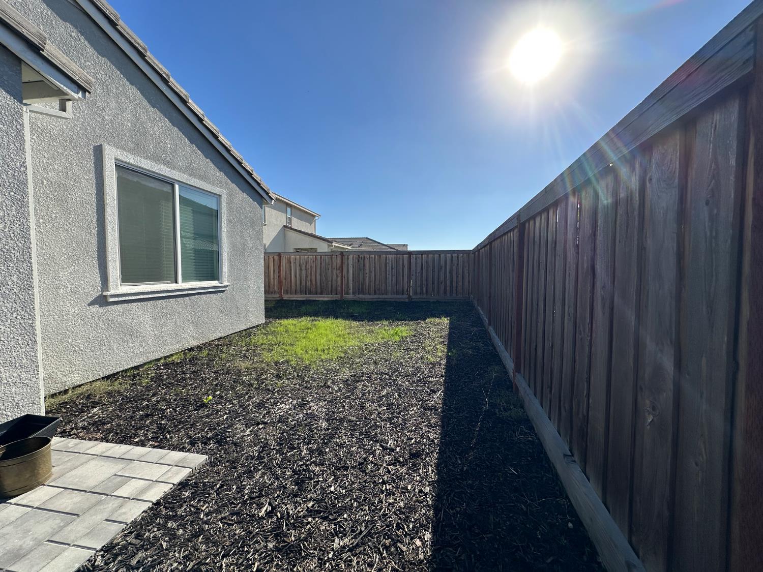 10113 Wayfaring Drive Stockton, CA 95219 - Photo 22 of 26 a view of a backyard