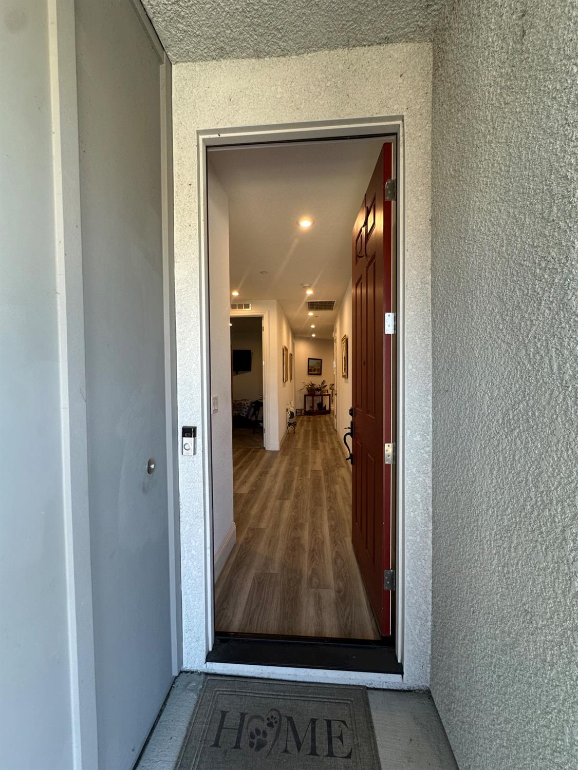 10113 Wayfaring Drive Stockton, CA 95219 - Photo 3 of 26 a view of a hallway with a living room