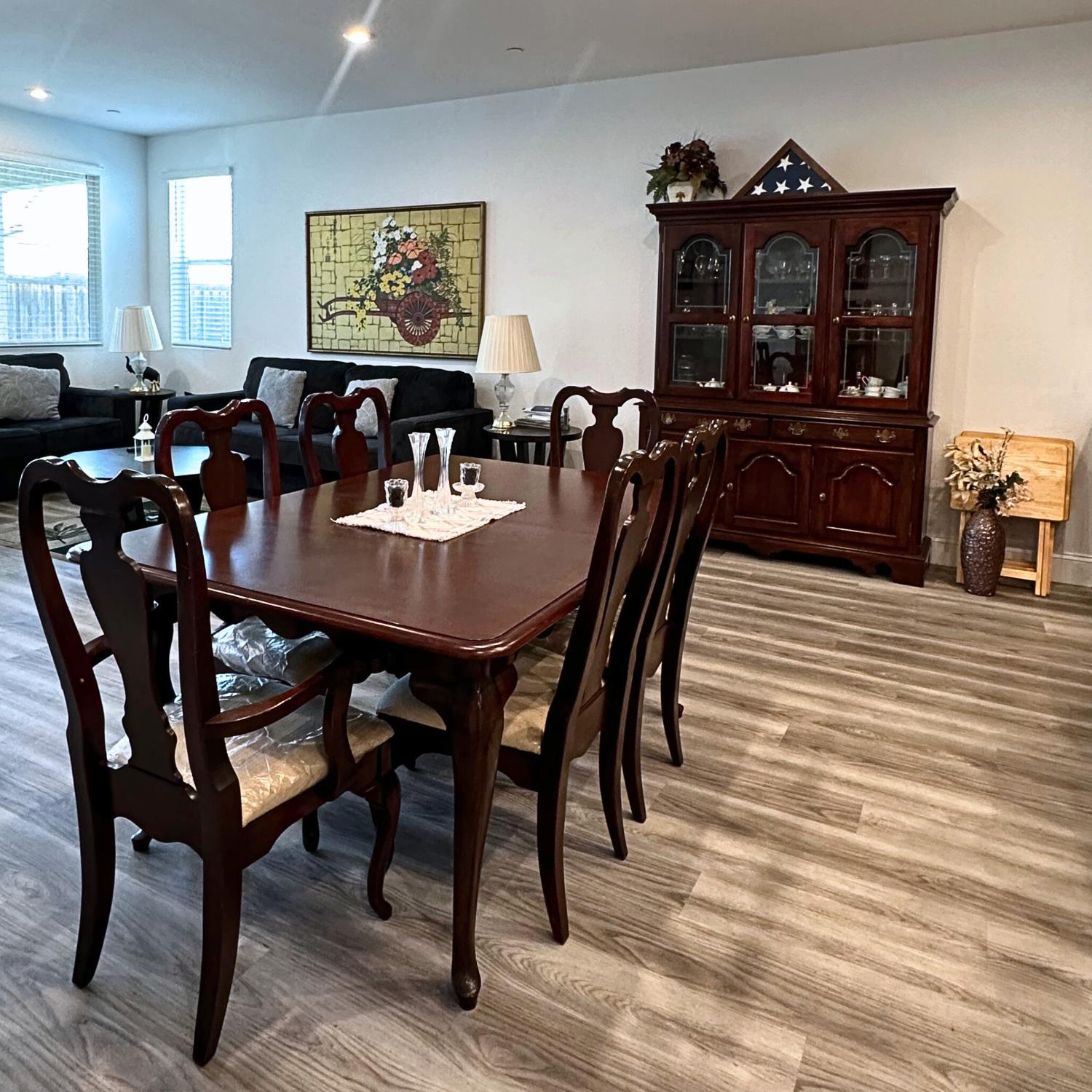 10113 Wayfaring Drive Stockton, CA 95219 - Photo 9 of 26 a view of a a dining room with furniture window and wooden floor