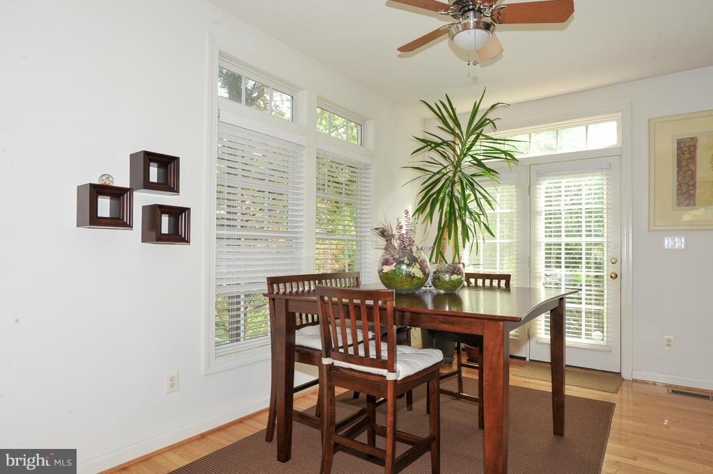 6625 Debra Lu Way Springfield, VA 22150 - Photo 5 of 26 a dining room with furniture and window