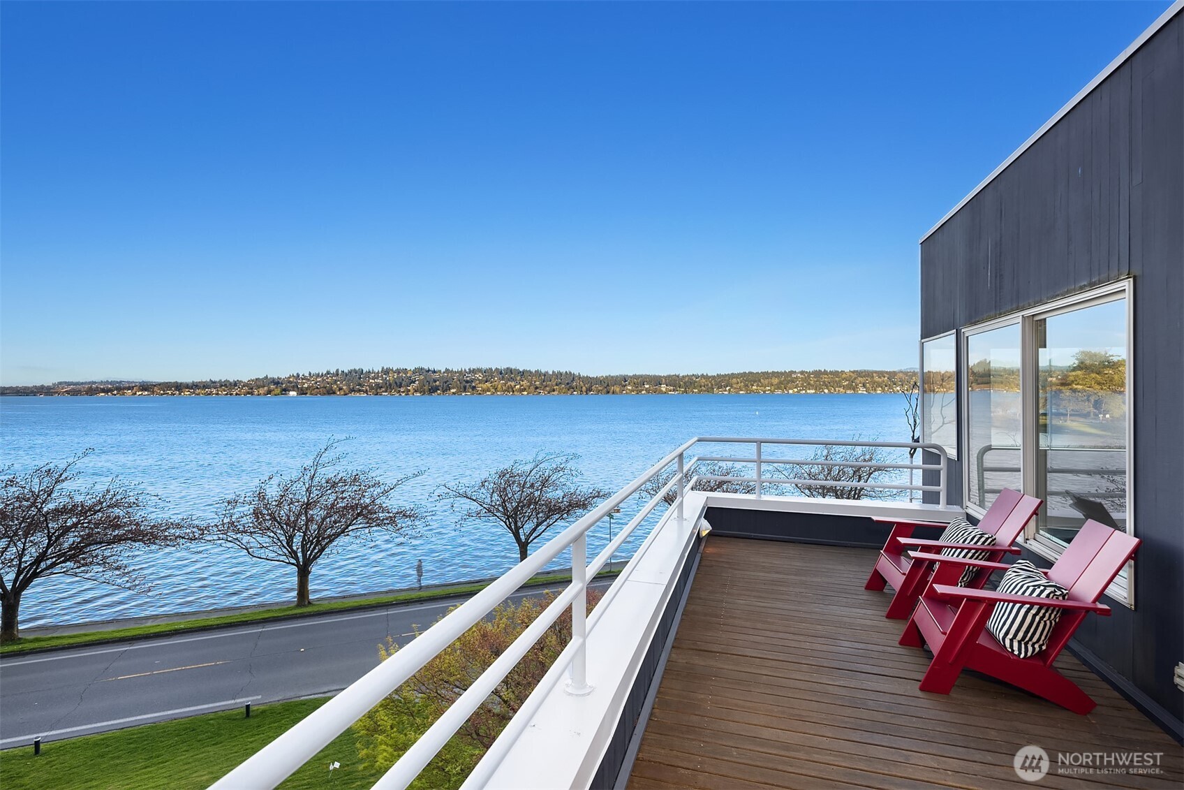 3903 48th Avenue South Seattle, WA 98118 - Photo 28 of 40 a view of roof deck with seating space and hardwood floor