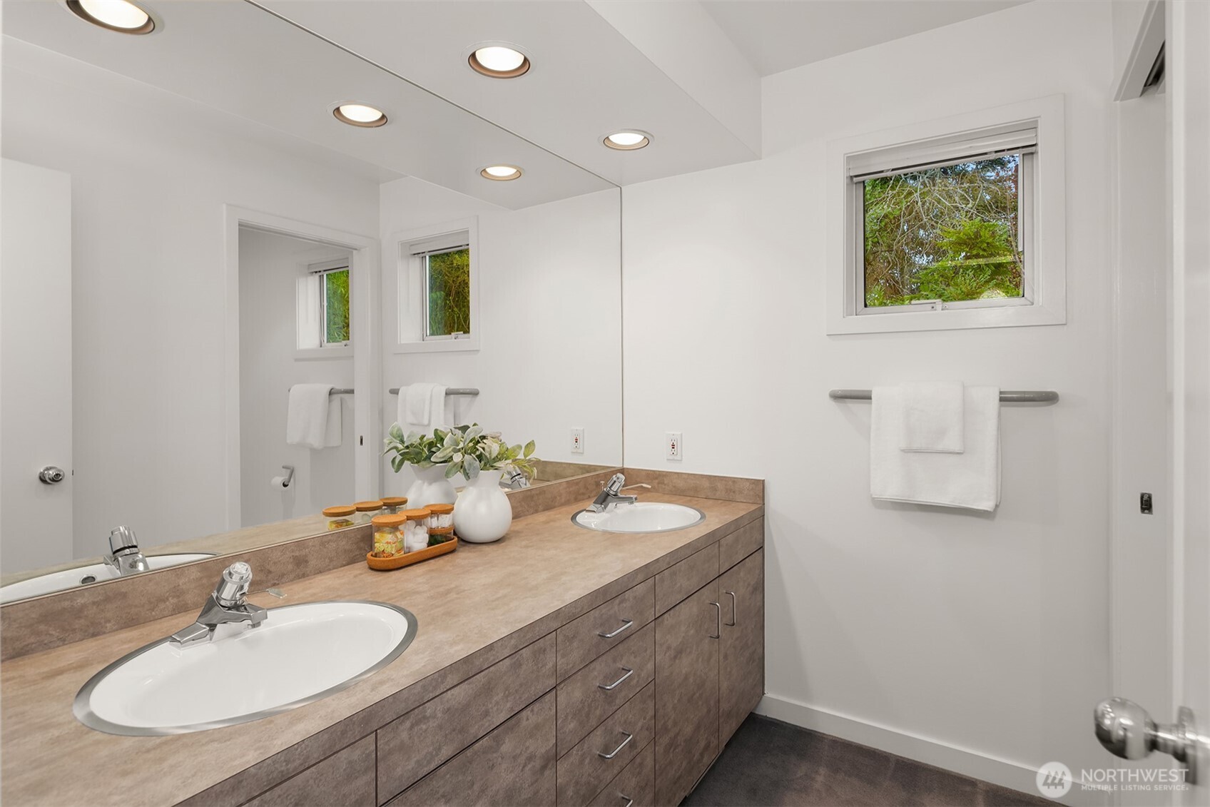 3903 48th Avenue South Seattle, WA 98118 - Photo 35 of 40 a bathroom with a sink and a mirror