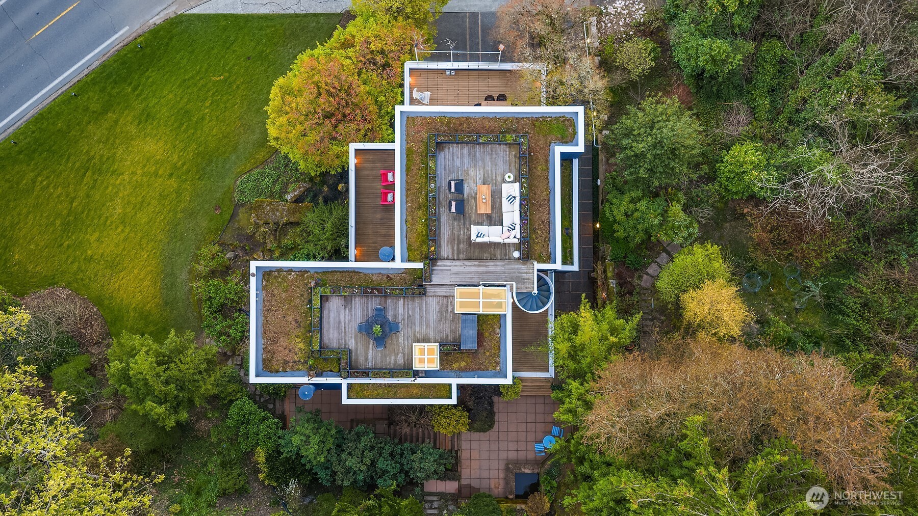 3903 48th Avenue South Seattle, WA 98118 - Photo 38 of 40 an aerial view of a house with a garden