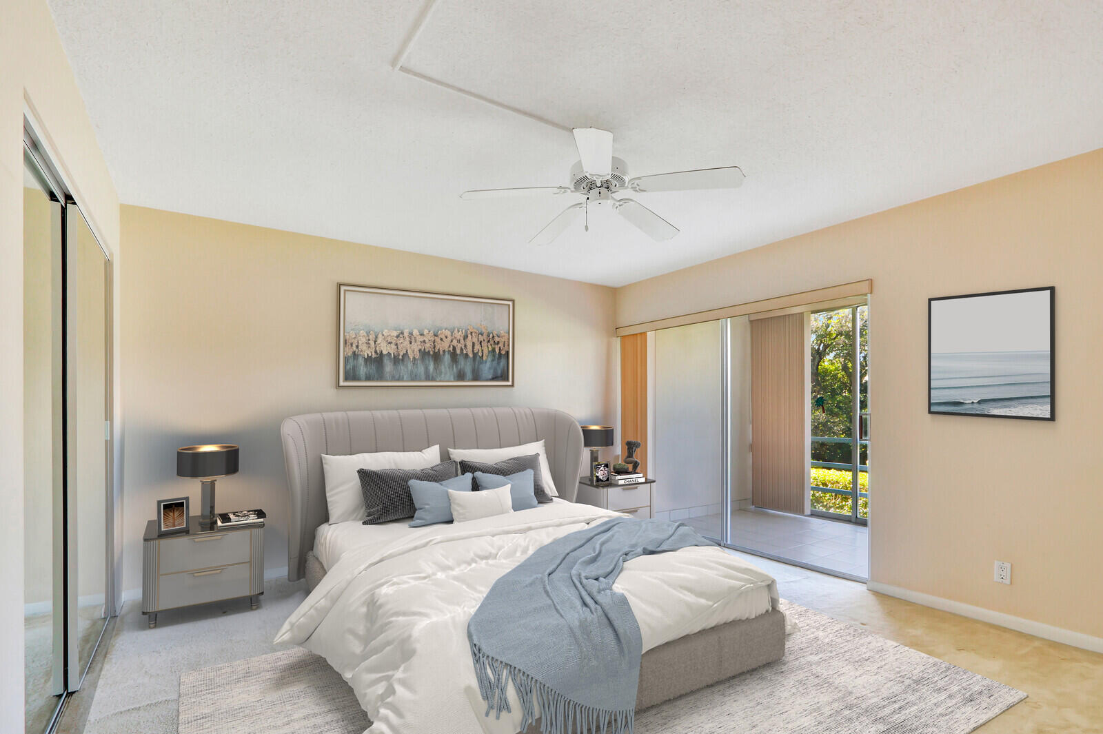 20 Celestial Way, Unit 214 Juno Beach, FL 33408 - Photo 11 of 33 a spacious bedroom with a bed and a lamp