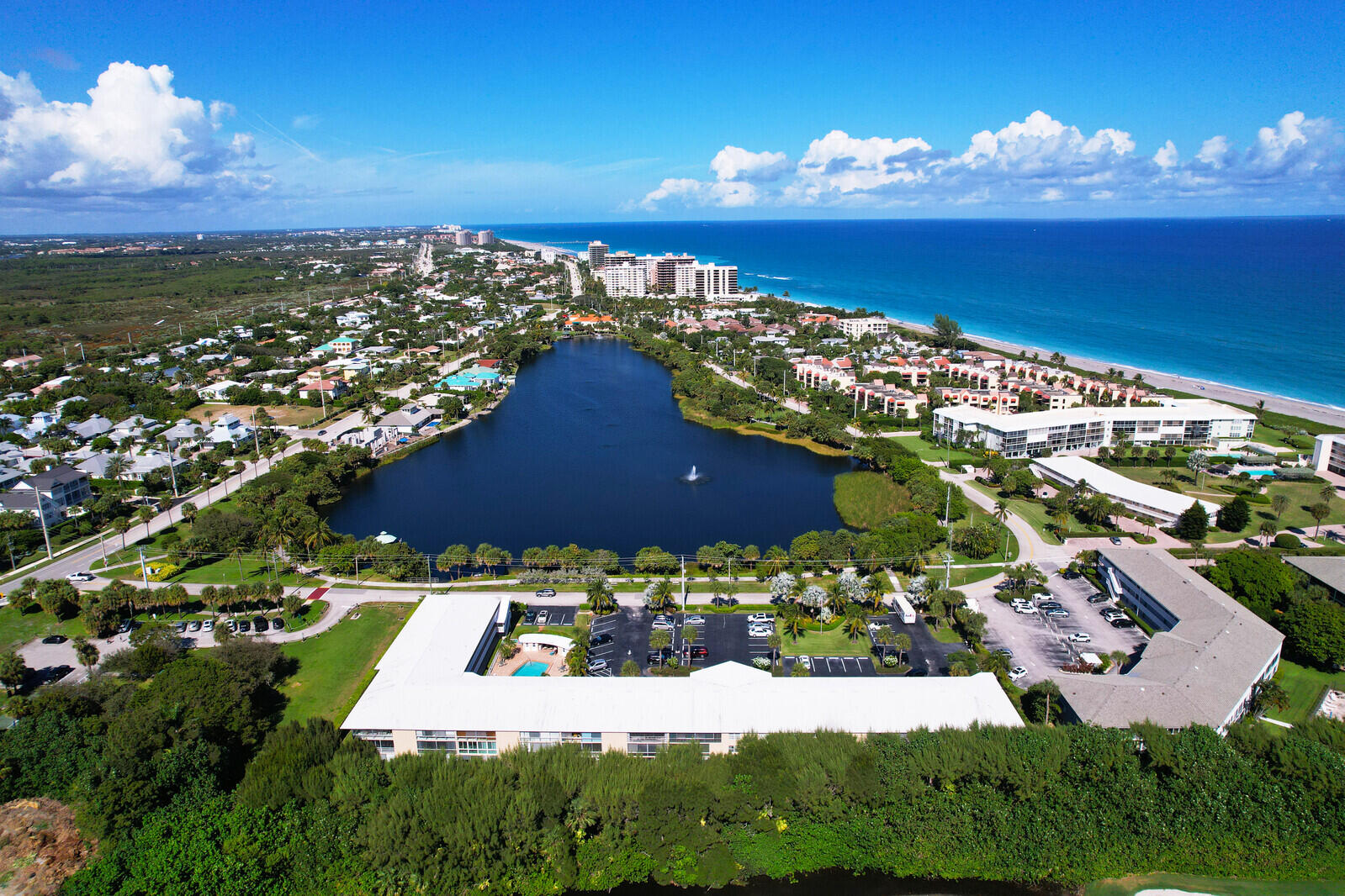 20 Celestial Way, Unit 214 Juno Beach, FL 33408 - Photo 19 of 33 a view of a house with a yard