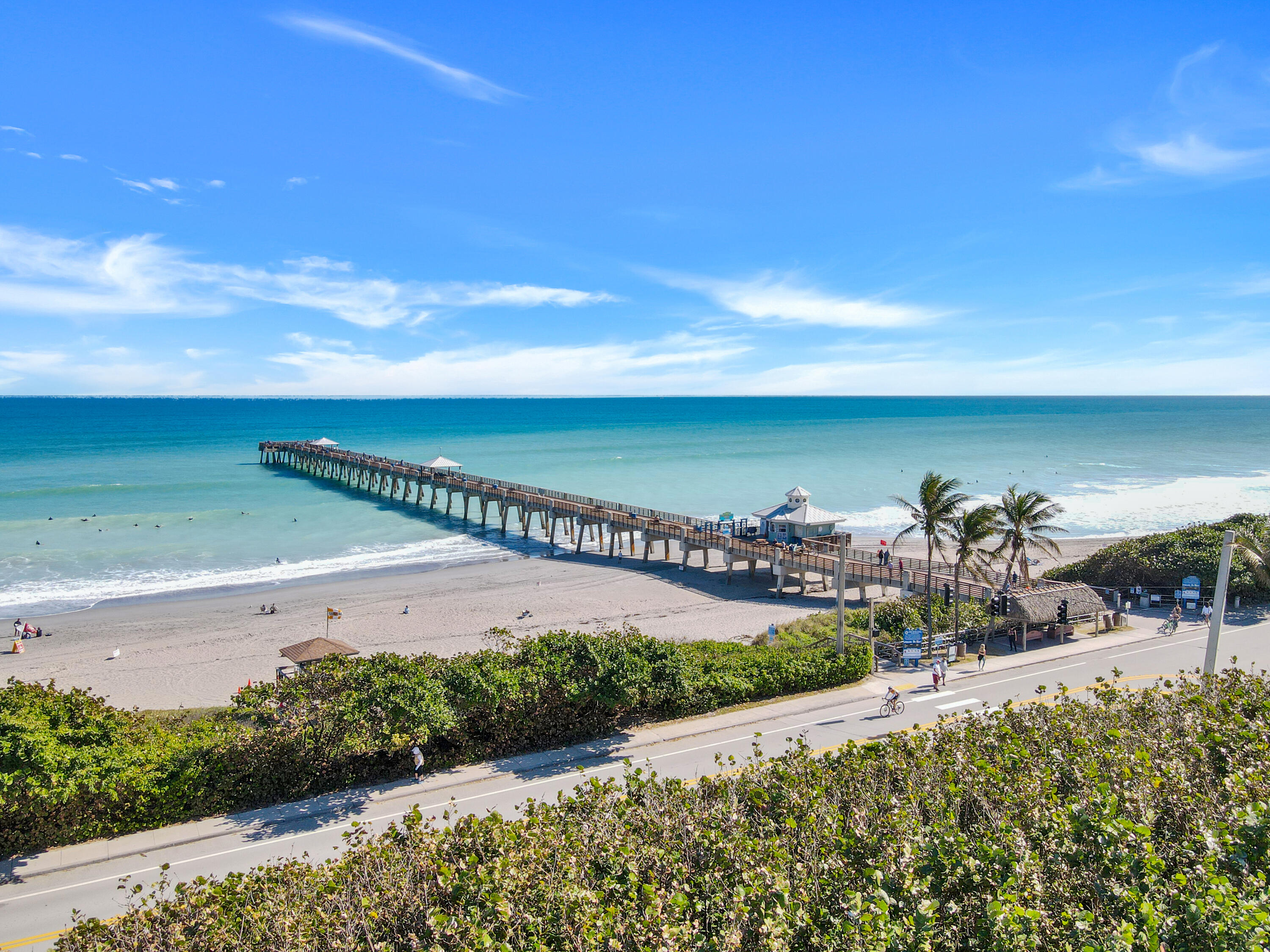20 Celestial Way, Unit 214 Juno Beach, FL 33408 - Photo 29 of 33 a view of a yard and ocean view