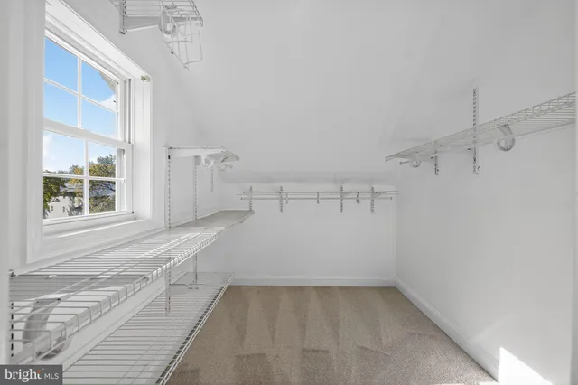 a view of a room with racks on the wall