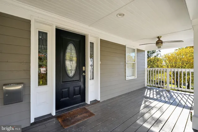 a view of entryway with wooden floor