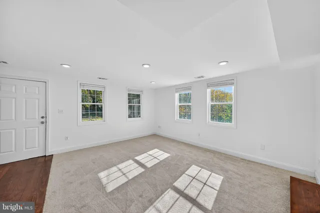 an empty room with windows