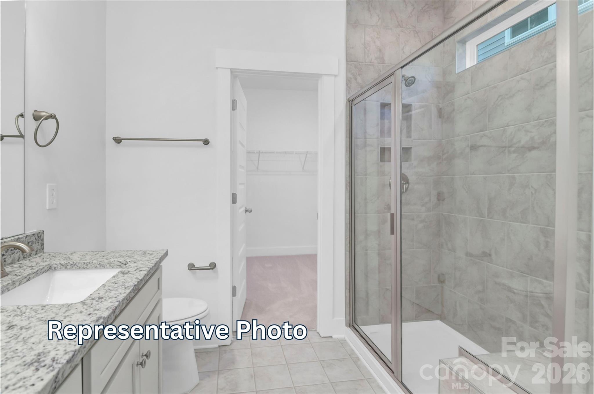 13122 Foxberry Road Charlotte, NC 28213 - Photo 15 of 20 a bathroom with a granite countertop sink a mirror and shower