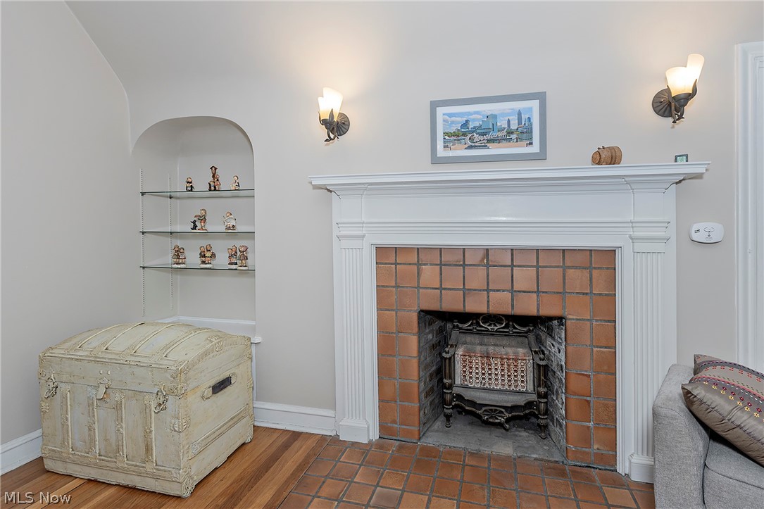 3259 Avalon Road Cleveland, OH 44120 - Photo 19 of 31 Detailed view of wood finished floors and a fireplace
