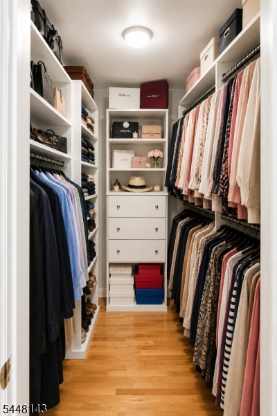 56 Union Hill Road Morris Plains, NJ 07950 - Photo 19 of 31 a view of walk in closet with clothes and shoes