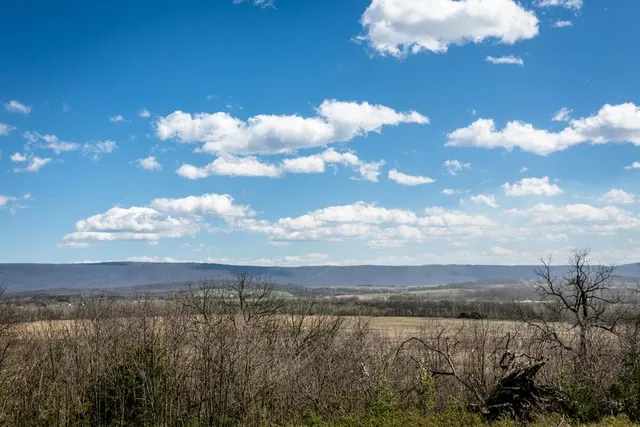 a view of lake with mountain
