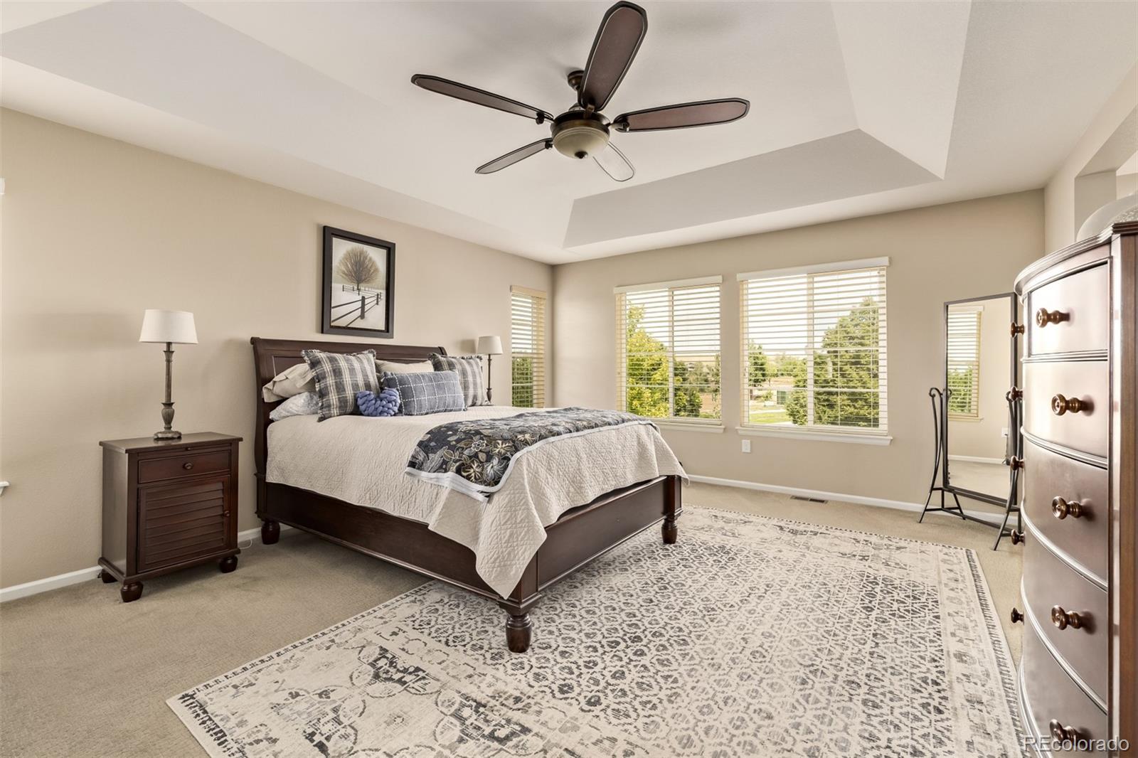 2289 Moss Place Erie, CO 80516 - Photo 21 of 45 a bedroom with a bed and large window