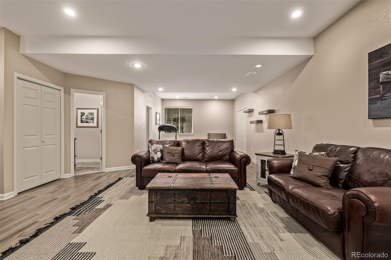2289 Moss Place Erie, CO 80516 - Photo 32 of 45 a living room with furniture