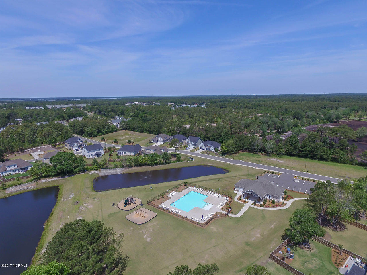 6022 Tarin Road Wilmington, NC 28409 - Photo 44 of 45 Pool, clubhouse (with gym) and play ground area