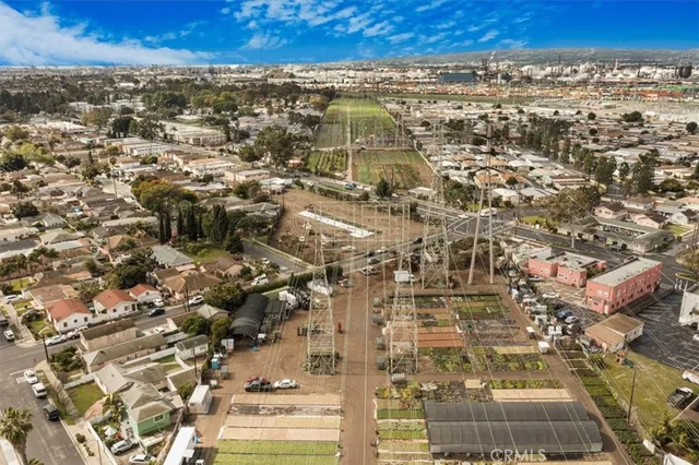 an aerial view of residential building and parking space