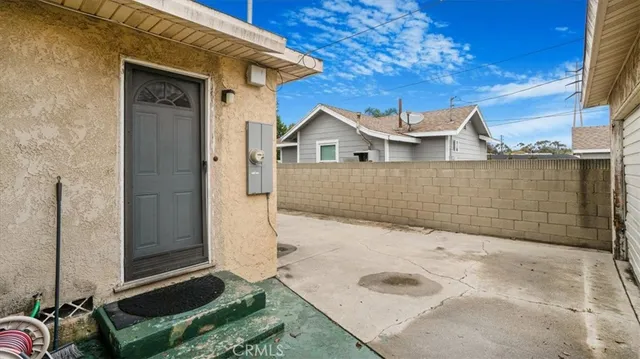 a view of outdoor space and front view of a house