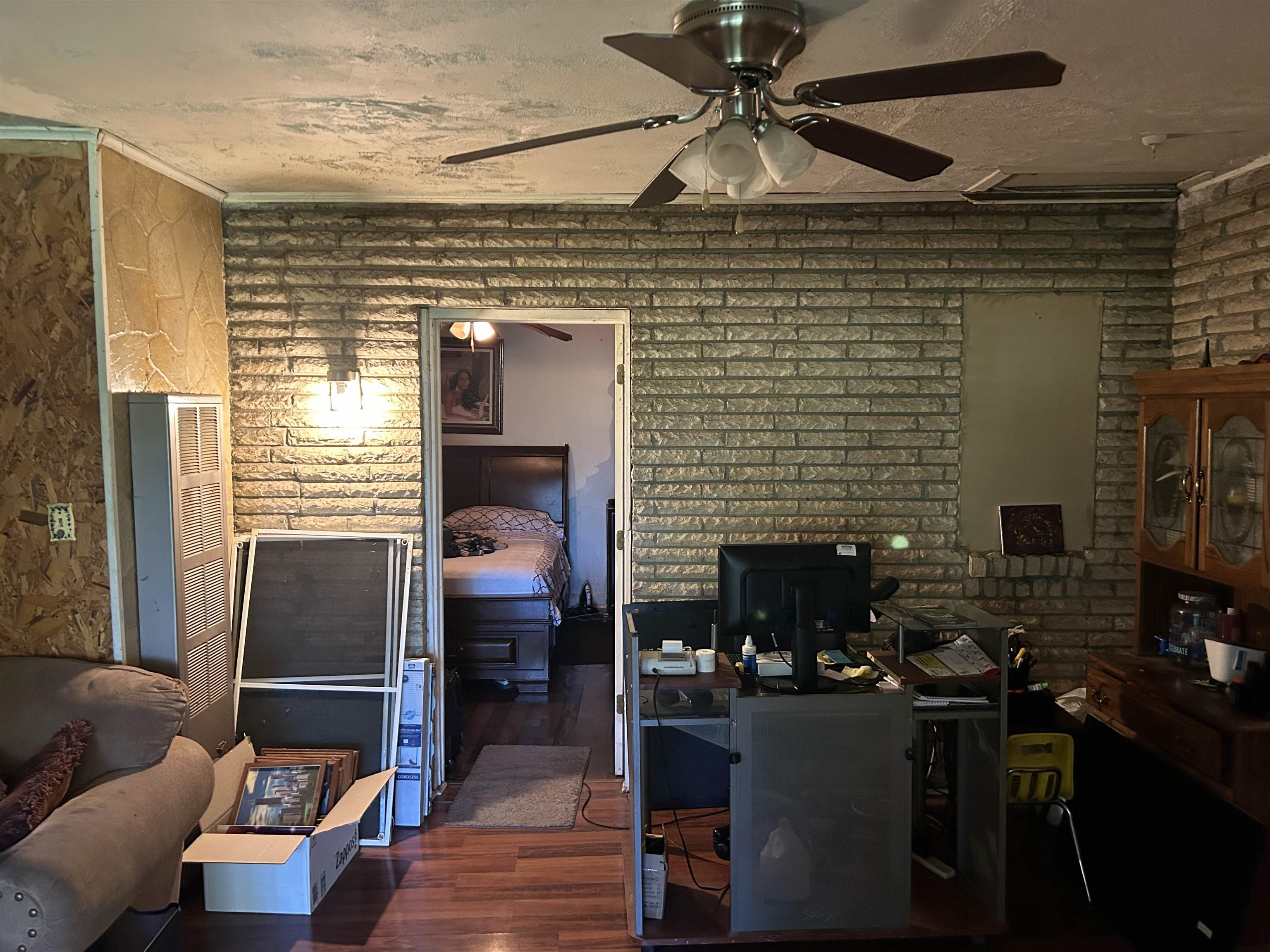 3158 Ford Road Memphis, TN 38109 - Photo 16 of 22 a living room with furniture and wooden floor