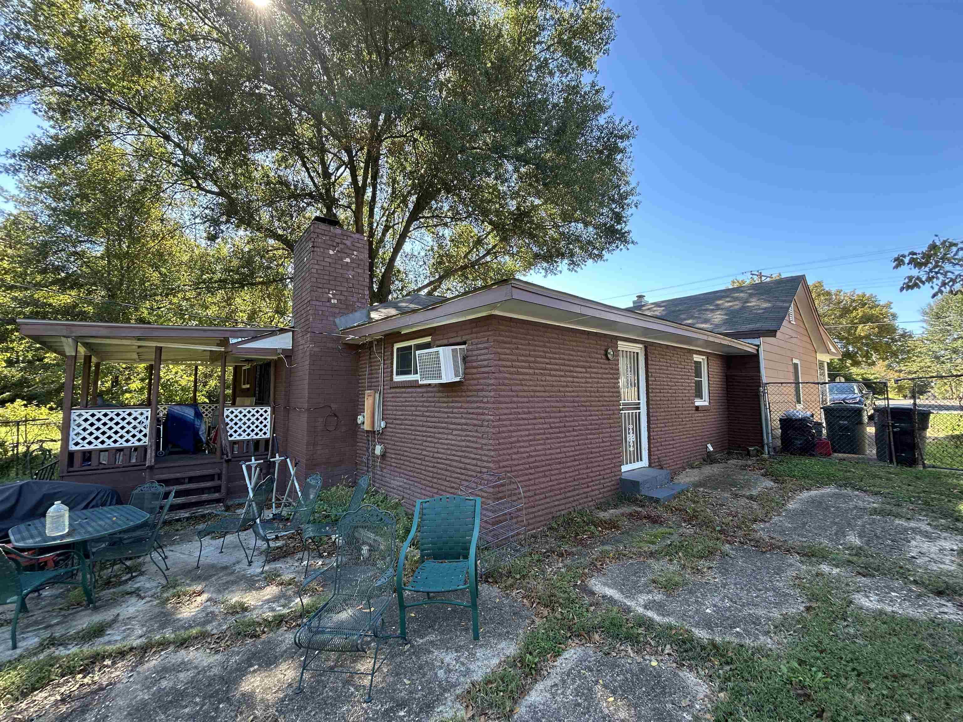3158 Ford Road Memphis, TN 38109 - Photo 20 of 22 a backyard of a house with barbeque oven