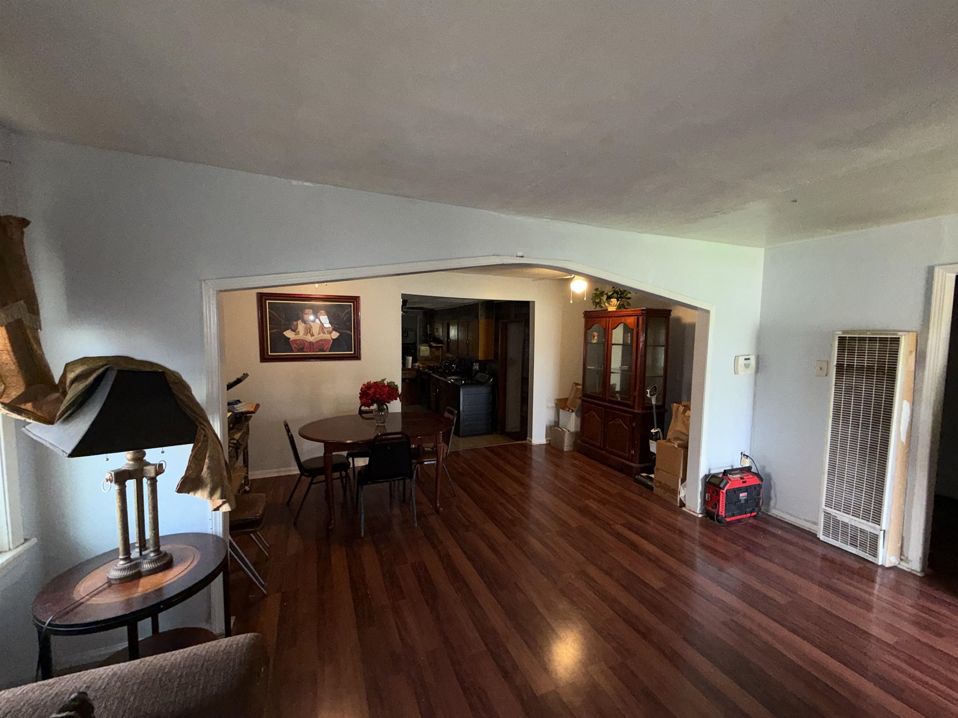 3158 Ford Road Memphis, TN 38109 - Photo 4 of 22 a living room with furniture and wooden floor