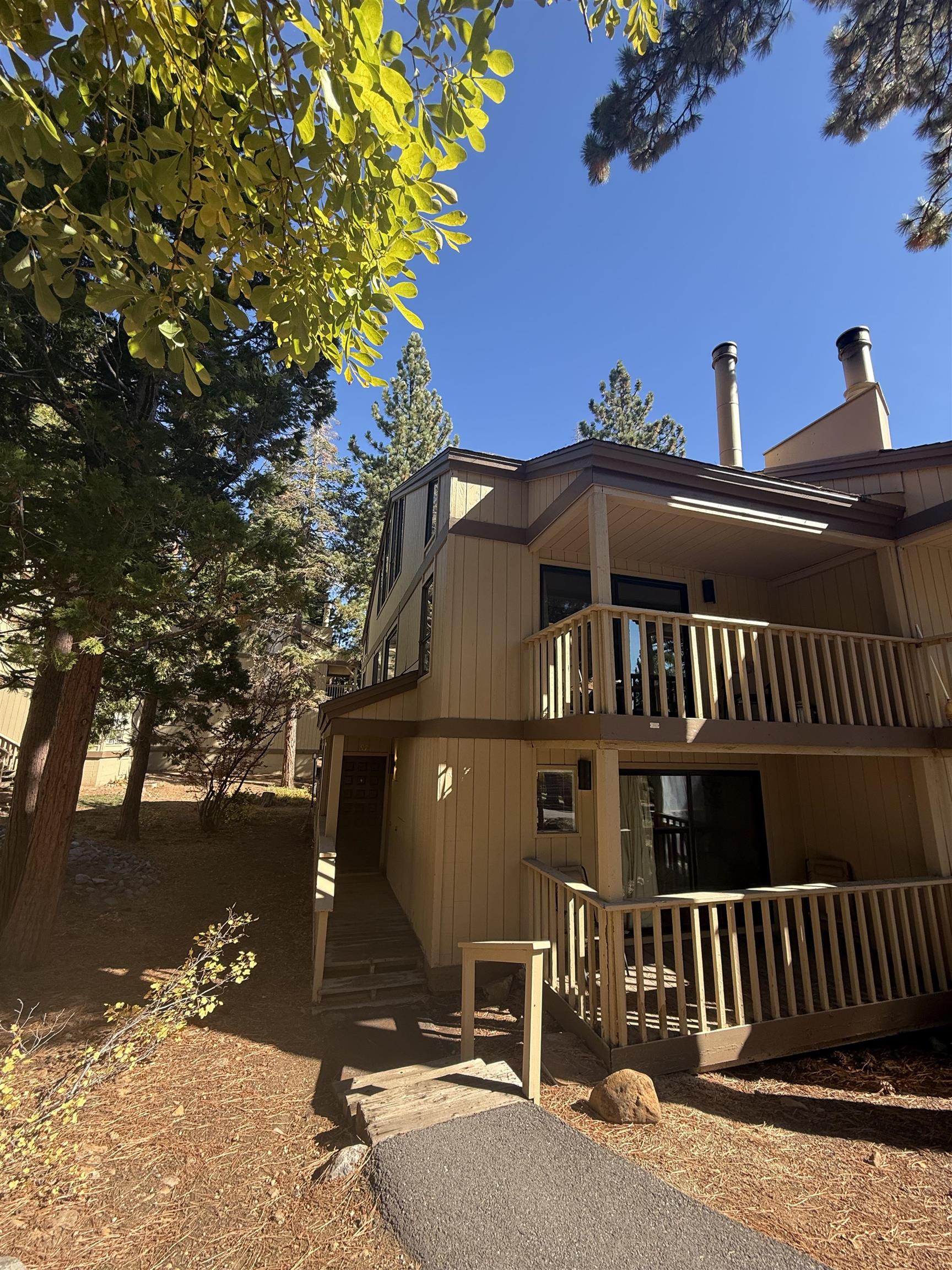 1001 Commonwealth Drive, Unit 97 Kings Beach, CA 96143 - Photo 1 of 28 a view of a house with a balcony