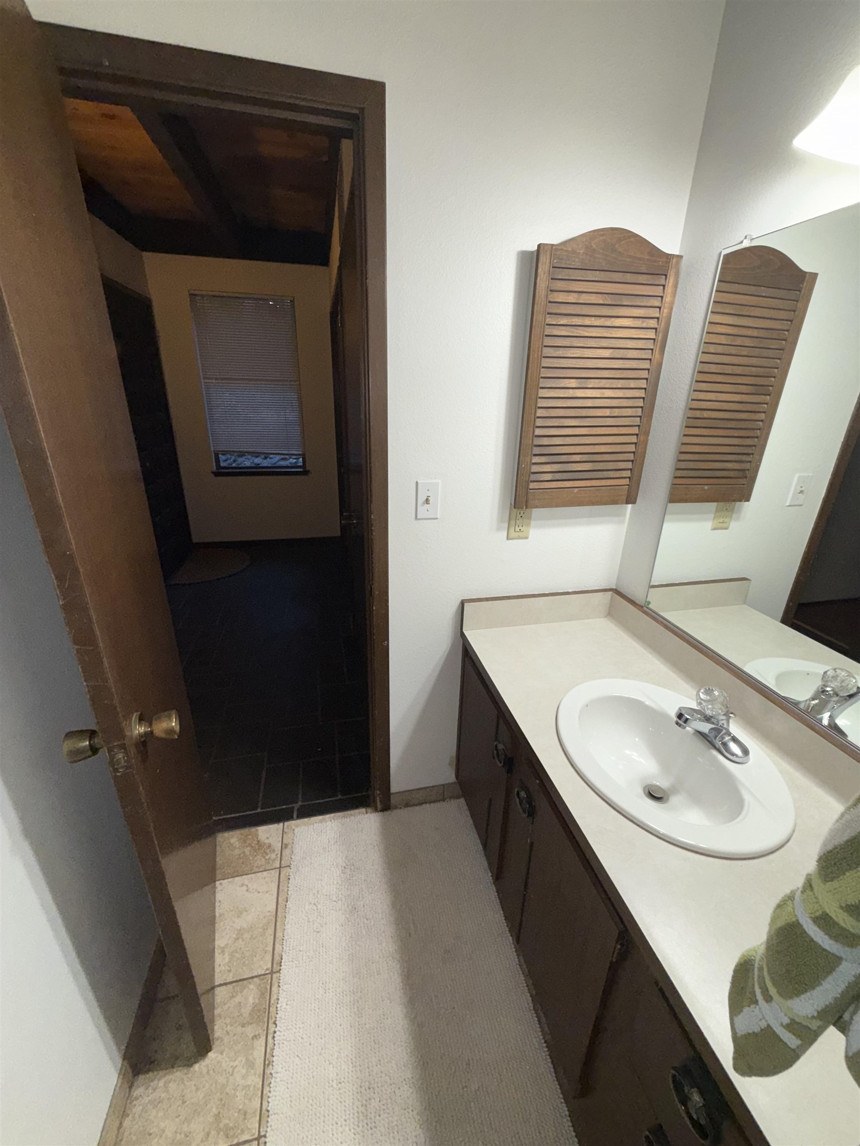 1001 Commonwealth Drive, Unit 97 Kings Beach, CA 96143 - Photo 18 of 28 a bathroom with a sink and a mirror