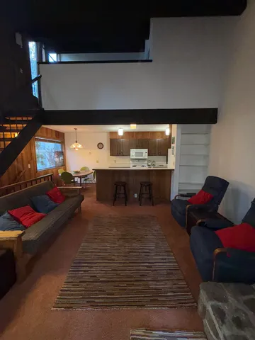 a living room with furniture and a couch