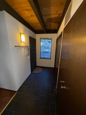 a view of a porch with furniture