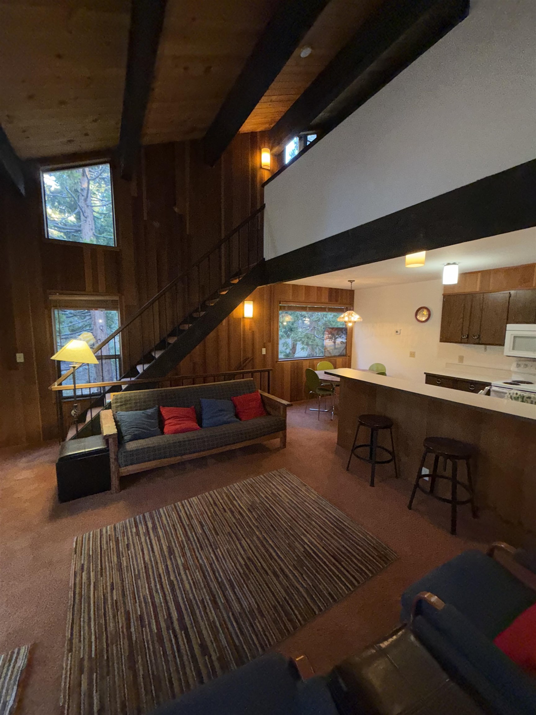 1001 Commonwealth Drive, Unit 97 Kings Beach, CA 96143 - Photo 7 of 28 a living room with furniture and a flat screen tv