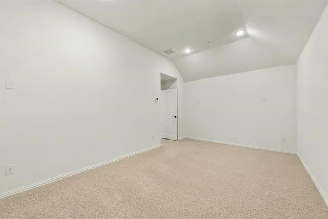 an empty room with an entryway
