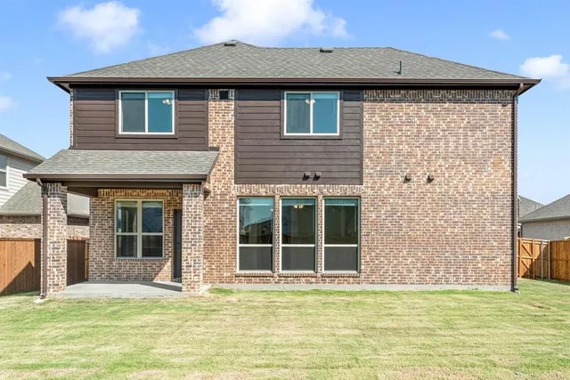 a view of house with yard