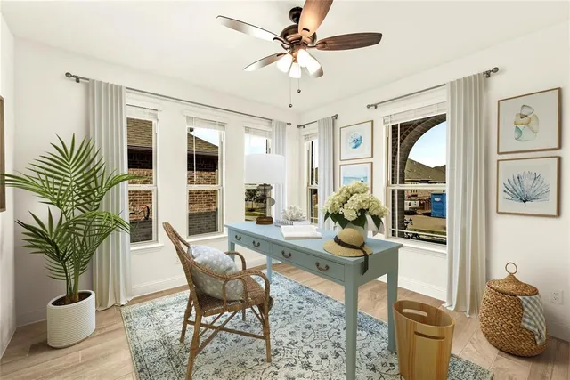 a living room with furniture flowerpot and a chandelier
